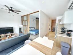 Modern 1BR • Pool + Rooftop • Prime location